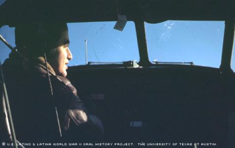 Robert Cardenas flying a C-47 tow plane.