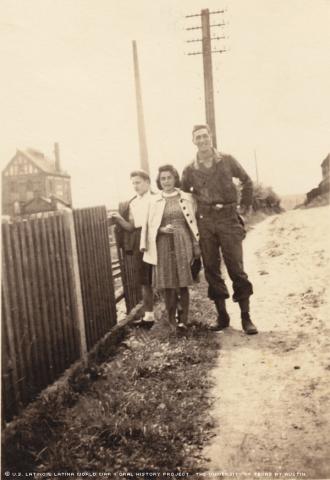 Mr. Valls with two German girls after the was was over. Mr. Valls remembers being asked by them if all Americans were as tall as him.
