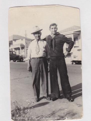 In this photo is Francisco Suarez (dad) and Ruben in San Diego, CA at the Naval Base. This photo was taken in July of 1943.\My dad went to San Diego from Tuscon to see me finish Boot Training.\""