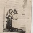Henrietta Rivas holds her son Robert and poses with Nikie Garcia in 1947 in Charlotte, Texas. This photograph is part of the personal collection of Henrietta Rivas, one of many Latina participants serving the United States during WWII.