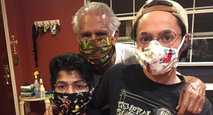 Rodriguez family, three individuals of varying ages, wearing masks